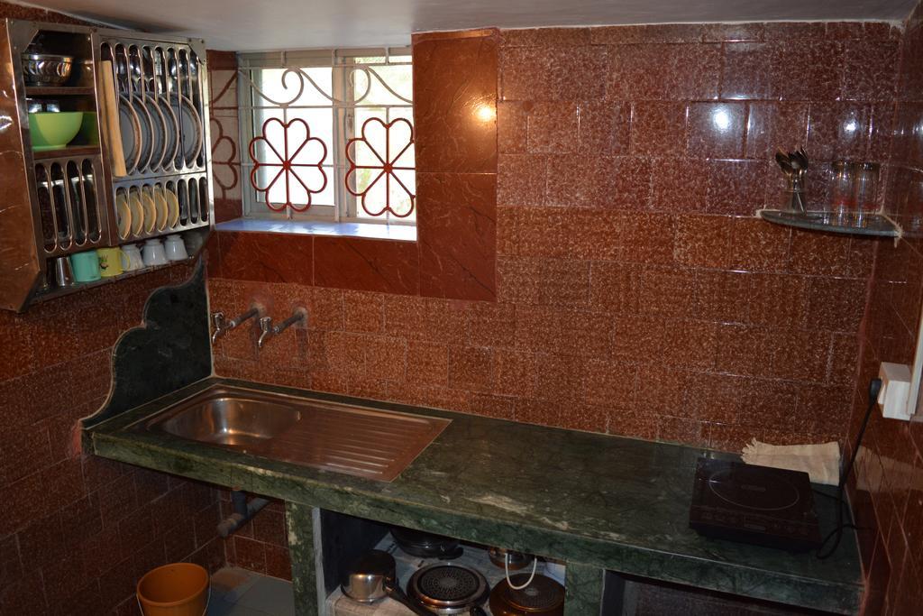 Vailankanni Guesthouse Morjim Pokoj fotografie